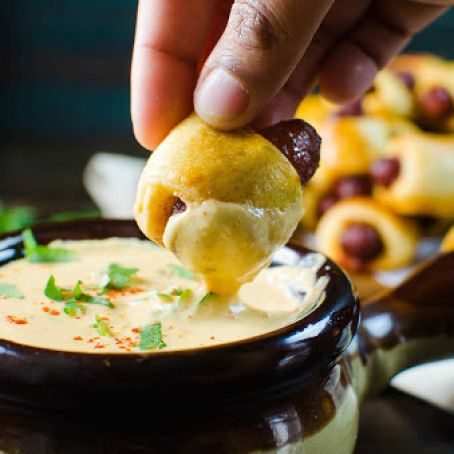 Sweet and Spicy Pigs in a Blanket with a Spicy Cheese dip