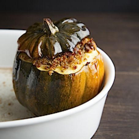 Acorn squash stuffed with pancetta, quinoa and walnuts