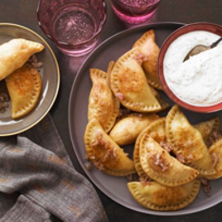 Potato Pierogi with Sour Cream-Chive Sauce
