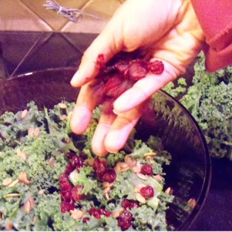 Holiday Kale Salad with Cranberries, Almonds, Pumpkin Seeds, and Crystallized Ginger
