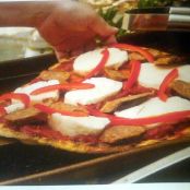 Mozzarella, Sausage and red bell pepper pizza