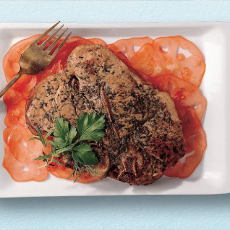 Veal chops with fresh herbs and tomatoes