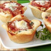 Sausage and Kale Pizzettes