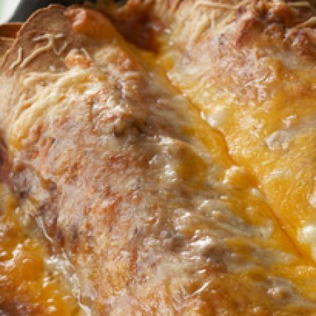 CHEESY TURKEY ENCHILADAS WITH TOMATILLO SALSA AND CILANTRO