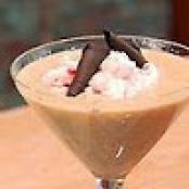 White Chocolate Rice Pudding with Cherries Jubilee and Sliced Almonds