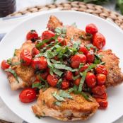Pan-Seared Crispy Chicken Thighs with Blistered Tomatoes and Basil