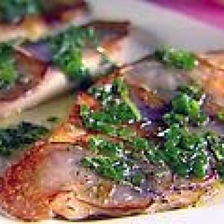 Tilapia with Purple Potato Crust and Chive Rosemary Oil