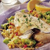 Lemoney Fish over Vegs and Rice