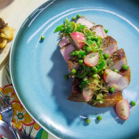 Skillet Roasted Pork Chops with Spring Vegetables and Mustard Sauce