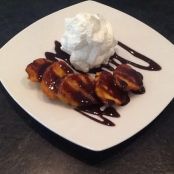 Fried plantains with cinnamon & sugar, chocolate syrup & whipped cream