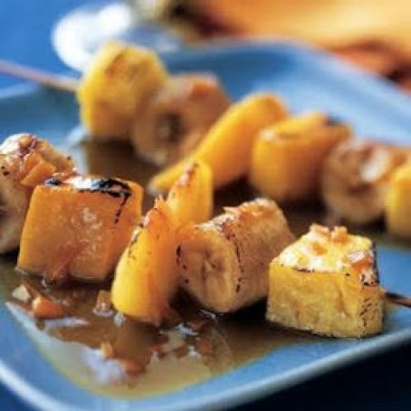Tropical fruit kebobs with rum sauce