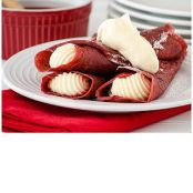 Red Velvet Crepes with Cheesecake Mousse and Raspberry Sauce