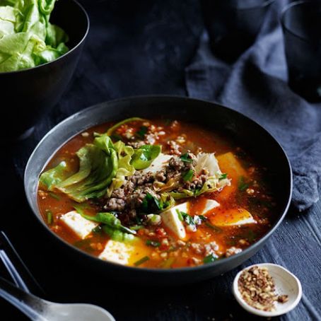 Spicy Sichuan-style soup with pork, lettuce and soft tofu