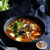 Spicy Sichuan-style soup with pork, lettuce and soft tofu