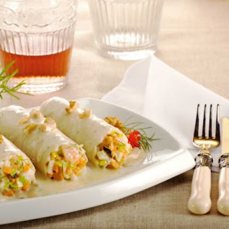 CANELONES RELLENOS DE MARISCOS EN SALSA DE HONGOS