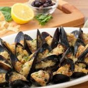 Baked Stuffed Mussels with Focaccia and Lemon appetizer