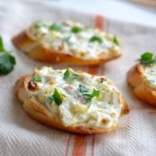 Cheesy Artichoke Baguette Bites