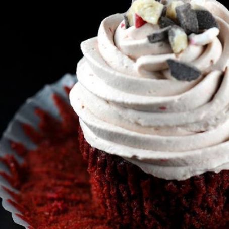 Peppermint Bark Red Velvet Cupcake with Hot Chocolate Whipped Cream Frosting