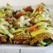 Raw Vegan Enchiladas with Chunky Salsa, Cheesy Sauce, and Spicy Nut Meat