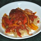 Braised Chicken Thighs With Bell Peppers, Olives and Tomatoes