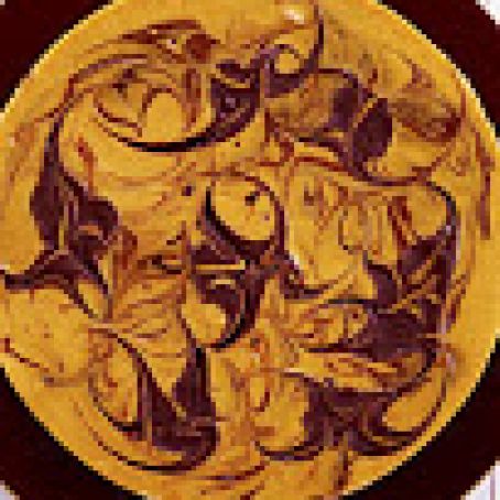 Marbled Pumpkin Cheesecake with a Brownie Crust