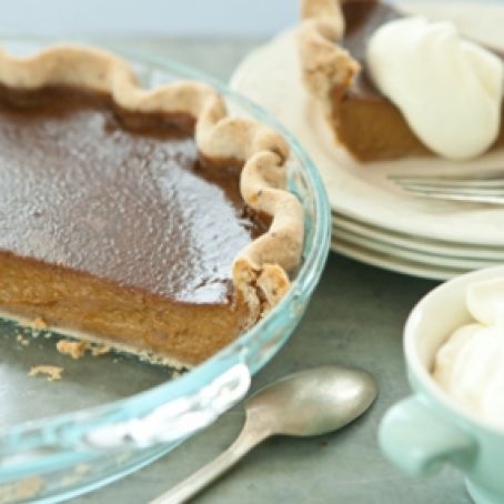 Pumpkin Pie With Pecan Crust And Cinnamon Spiced Whipped Cream
