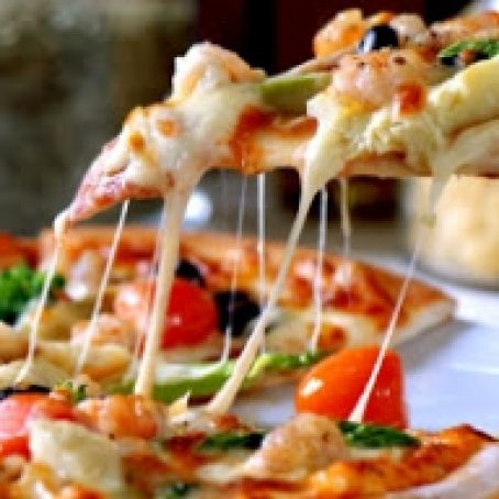 Todd's Naan Flat Bread Arugula and Artichoke Pizza