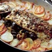 Chermoula-marinated sea bass stuffed with olives & preserved lemon