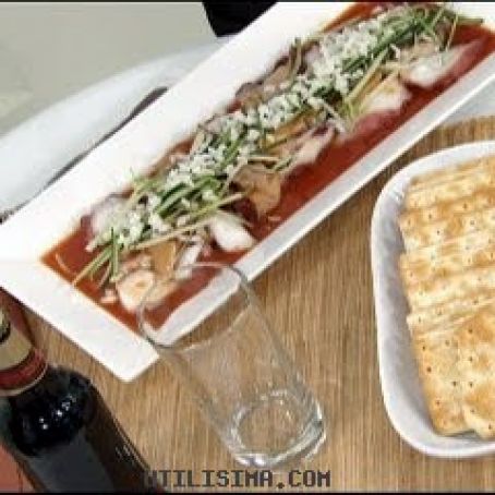 CARPACCIO DE PULPO Y ALMEJA EN JUGO DE CLAMATO