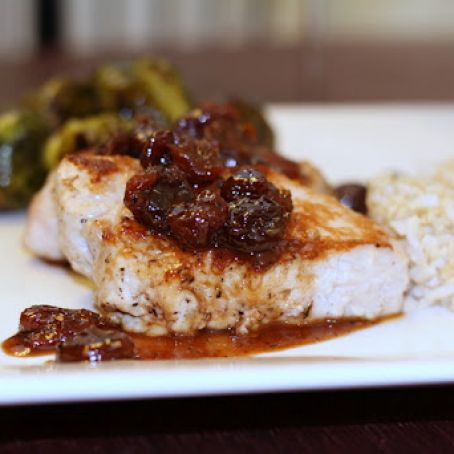 Medallions of Pork with Dried Cherries and Apple Juice Reduction