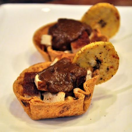Oaxacan Black Mole with Mesquite-Smoked Tofu and Polenta in Tortilla Cups with Plantain Chips