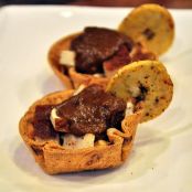 Oaxacan Black Mole with Mesquite-Smoked Tofu and Polenta in Tortilla Cups with Plantain Chips