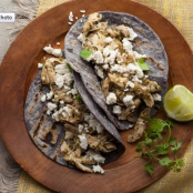 Shredded Chicken and Tomatillo Tacos with Queso Fresco