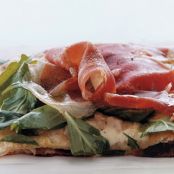 PIZZA WITH FONTINA, PROSCIUTTO, AND ARUGULA