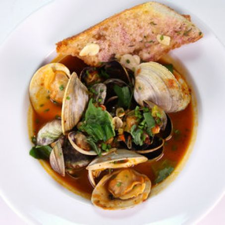 Mario Batali's Steamed Clams in Spicy Brodetto with Garlic Bread