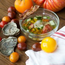 Smoked Tomato Consommé With Poached Oysters, Bacon, Cucumbers & Tomatoes