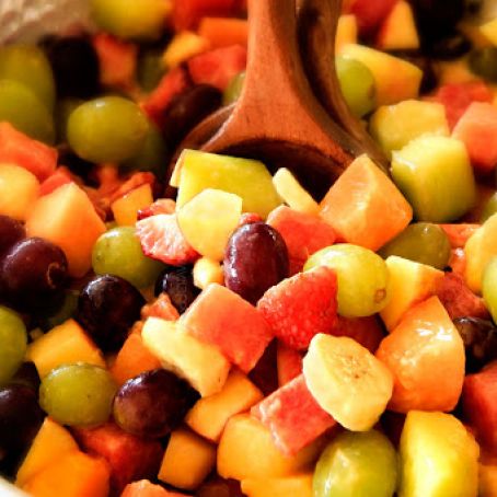 STRAWBERRY MELON FRUIT SALAD WITH CREAMY CITRUS GLAZE