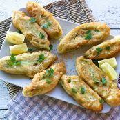 Pan-Fried Zucchini Flowers Stuffed With Ricotta, Goat Cheese, & Fresh Herbs