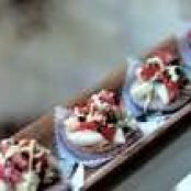 BLUE CORN BLINIS w/CRAB & AVOCADO CREMA