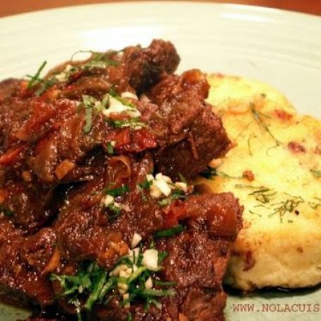 Grillades with Andouille Cheese Grit Cakes