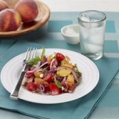 Tomato and peach salad with feta and red onion