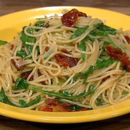 Mario Batali's Spaghettini with Sun-Dried Tomatoes and Arugula*
