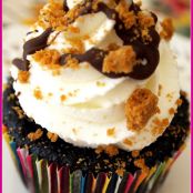 Dark Chocolate Cupcakes filled with Biscoff Spread and topped with Whipped Cream Frosting