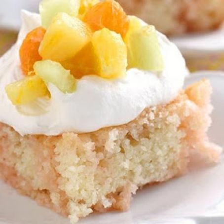 Peach-Mango Sunrise Poke Cake