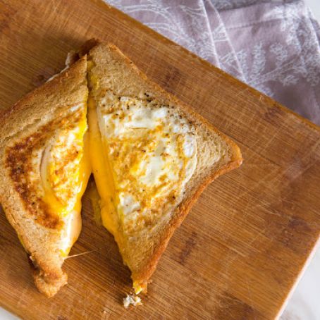 Grilled Cheese Eggsplosion (Grilled Cheese With Fried Eggs Cooked Into the Bread) Recipe