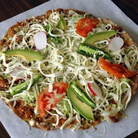 Tlayudas (Grilled Tostadas with Chorizo, Tangy Guacamole and Fresh Cheese)