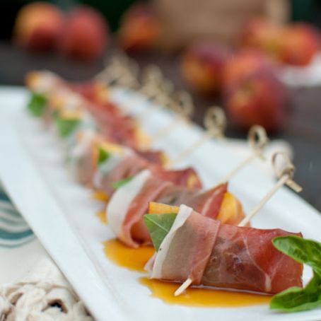 Peaches in Prosciutto Over Lemony Ricotta and Herb Salad