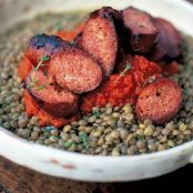 Sausages and green lentils with tomato salsa
