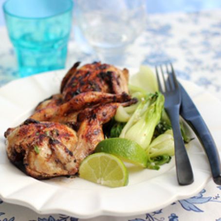 Asian marinated grilled quail with bok choy.