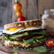 Bourbon Caramelized Bacon and Heirloom Tomato BLT w/Fried Eggs + Smoked Gouda.